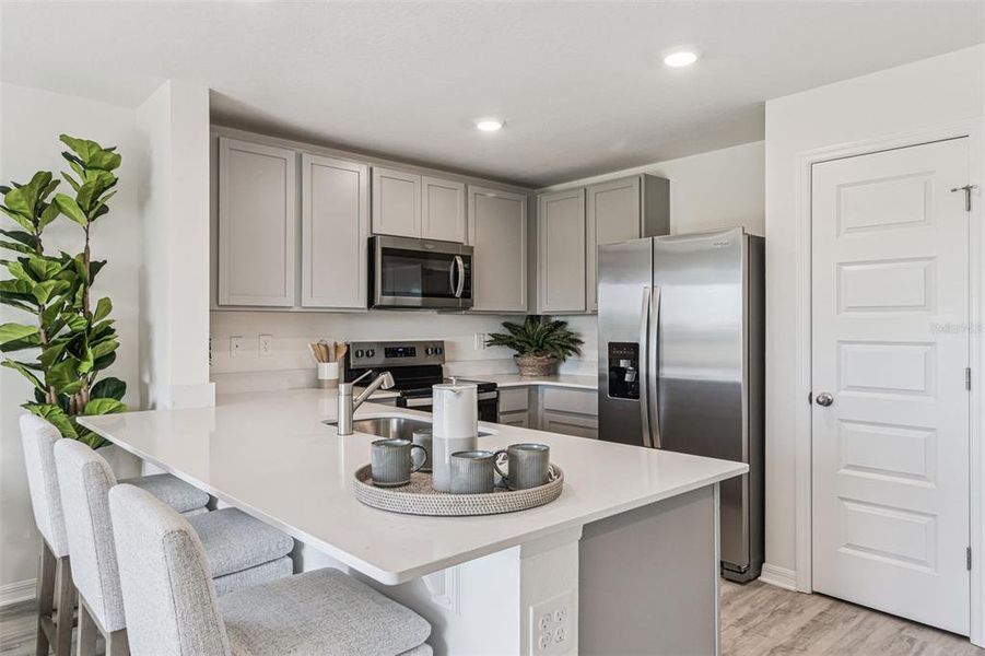 Furnished interior view inside a new home in Danbury at Ridgewood Lakes, Davenport (Image 12). Furnished interior view inside a new home in Danbury at Ridgewood Lakes, Davenport (Image 12).