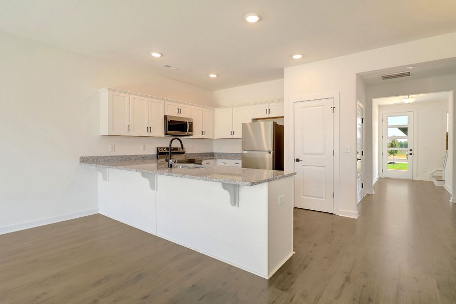 Representative furnished interior of a home built from the Ivey by Hunter Quinn Homes in Westgate Village Townes, Spartanburg (Image 5). Representative furnished interior of a home built from the Ivey by Hunter Quinn Homes in Westgate Village Townes, Spartanburg (Image 5).