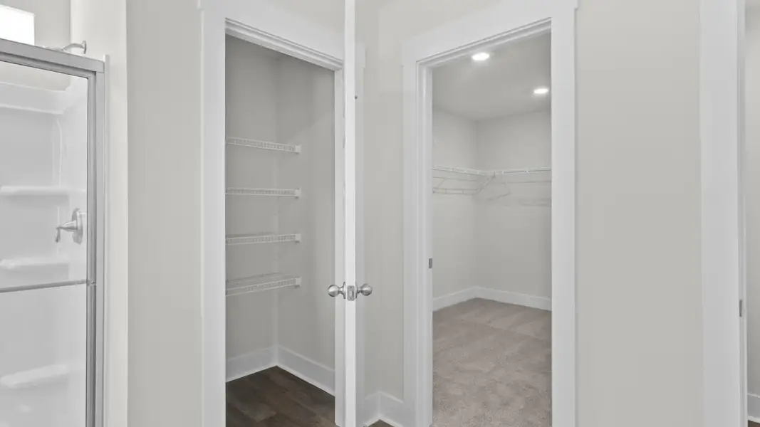 Spacious, unfurnished interior of a new home in The Highlands at Cedar Hill Landing, Navassa (Image 25).