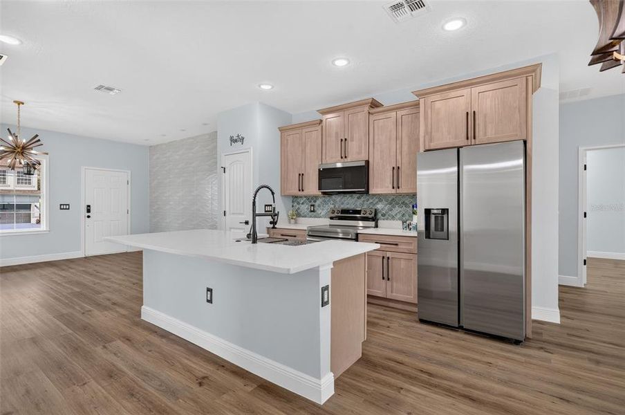 Furnished interior view inside a new home in , Poinciana (Image 6).