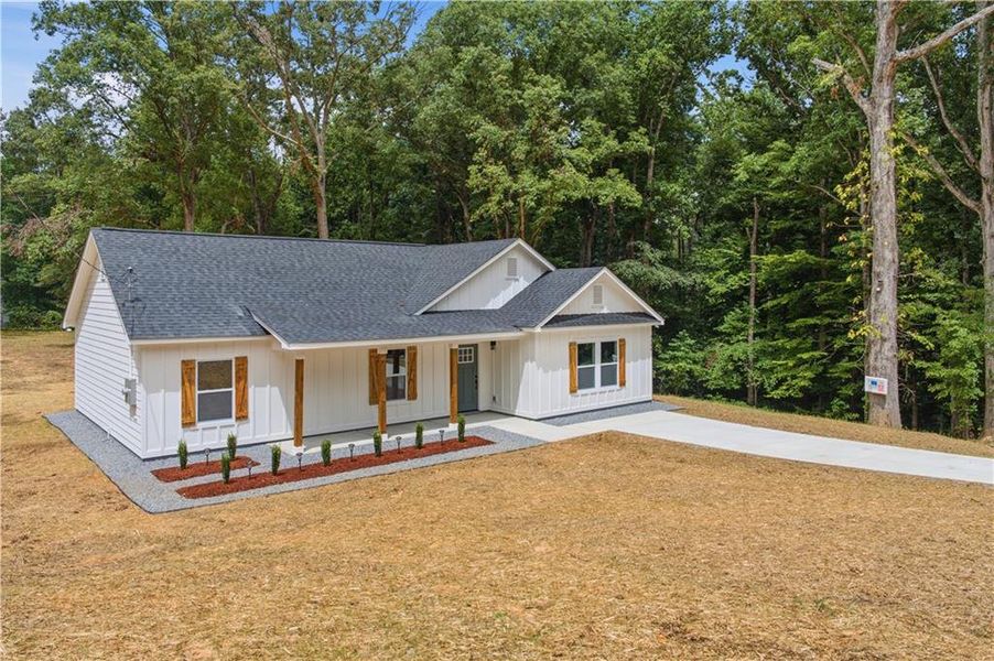 Front exterior of a new home in , Acworth, GA, highlighting curb appeal (Image 18).