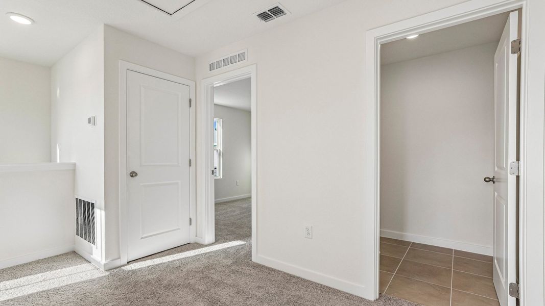 Furnished interior view inside a new home in Cyrene at Harmony, St. Cloud (Image 28).