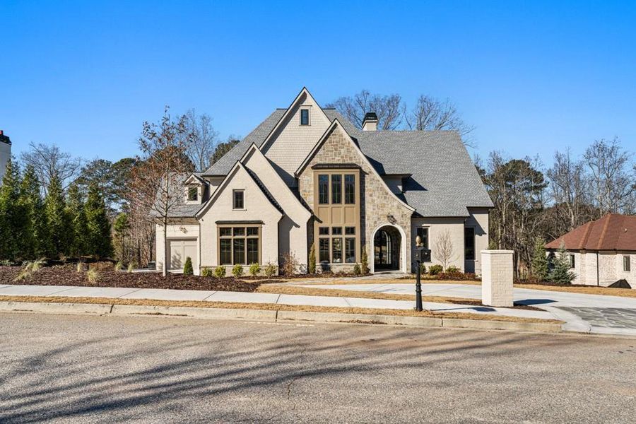 Front exterior of a new home in , Milton, GA, highlighting curb appeal (Image 38).