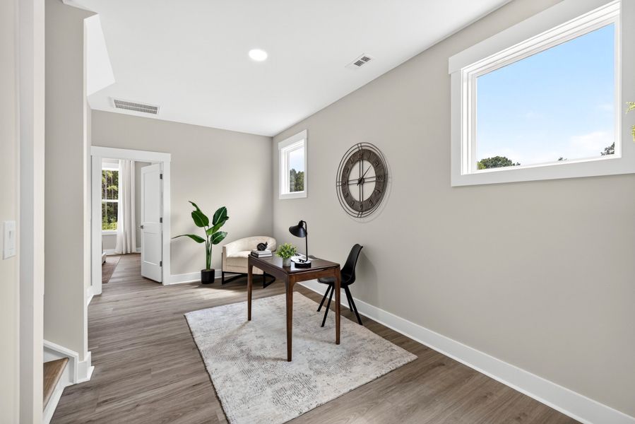 Representative furnished interior of a home built from the Weston End Unit by Baker Residential in Parc at Bradley Farm, Apex (Image 29).