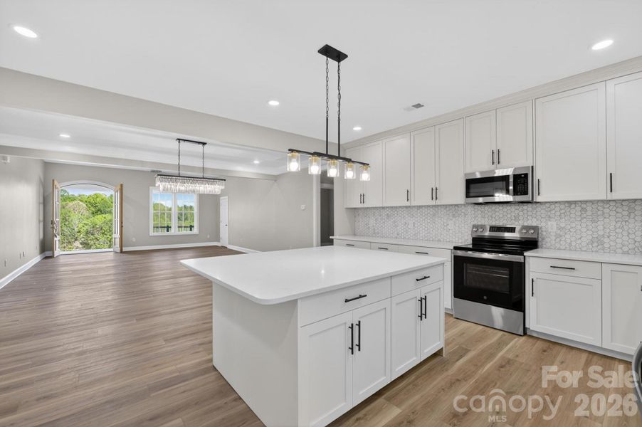 Furnished interior view inside a new home in , Lenoir (Image 9).