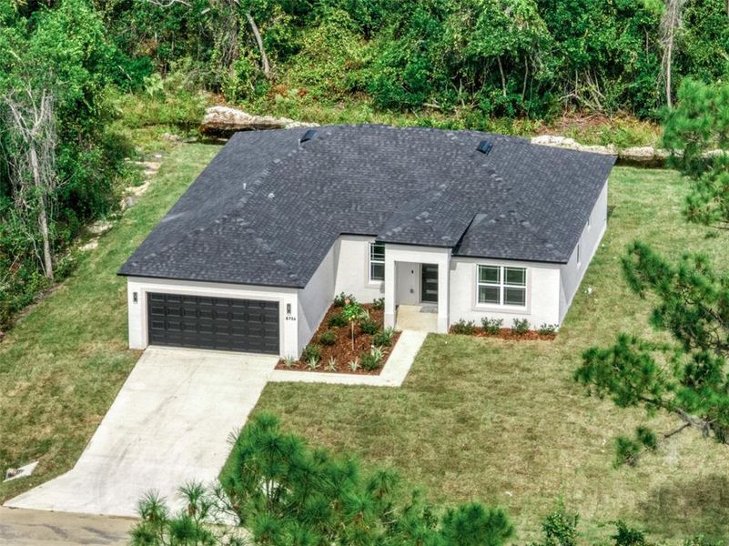 Front exterior of a new home in , Sebring, FL, highlighting curb appeal (Image 23).
