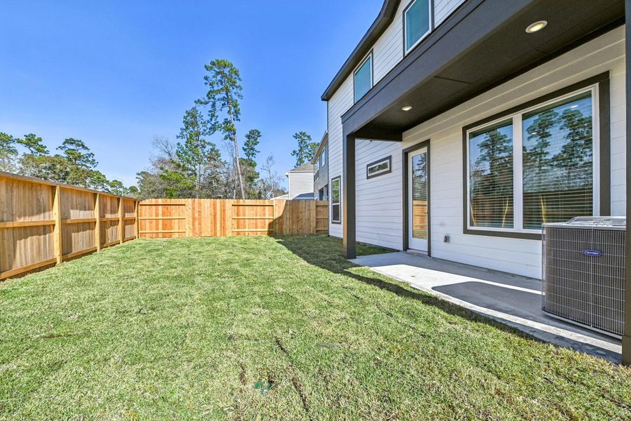 Exterior details and patio area of a home in Pinewood Trails - Luxe Series, Houston (Image 3).