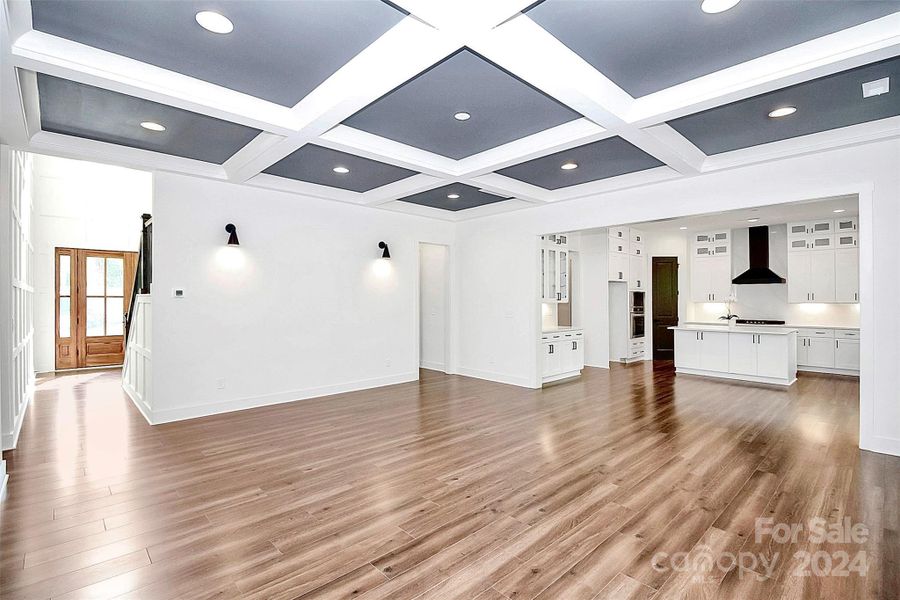 Primary bathroom with 2 vanities, floor to ceiling tile in shower, linen closet & water closet.