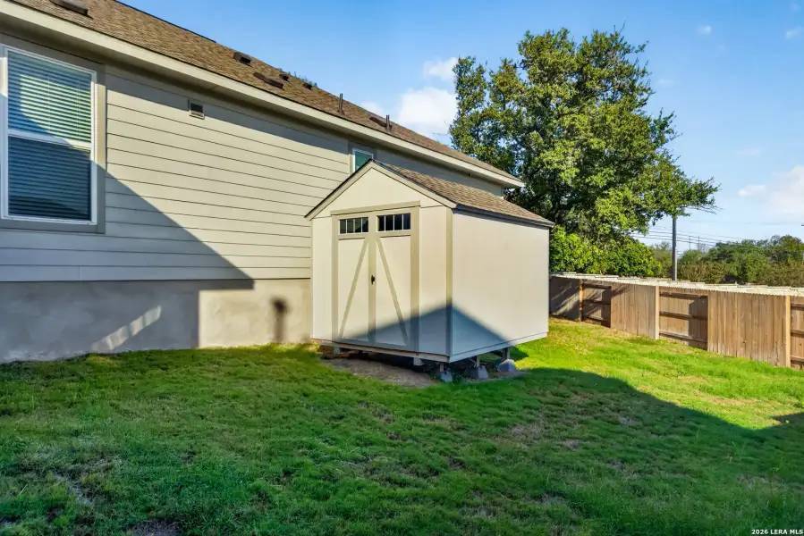 Exterior details and patio area of a home in Park Hill Commons, San Antonio (Image 21).