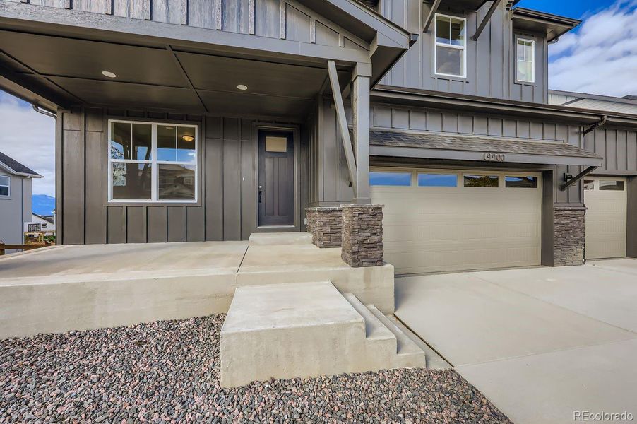 Exterior details and patio area of a home in Timber Ridge, Colorado Springs (Image 2).