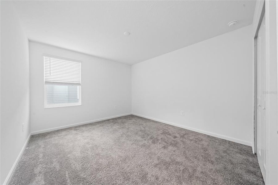 Spacious, unfurnished interior of a new home in Storey Creek, Kissimmee (Image 30).