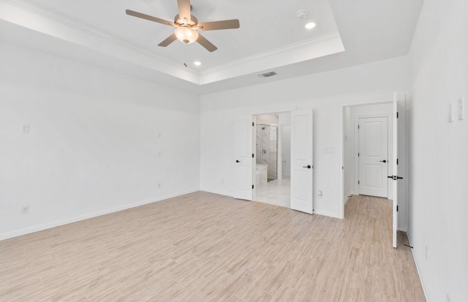 Spacious, unfurnished interior of a new home in Bluffview Reserve, Leander (Image 41).