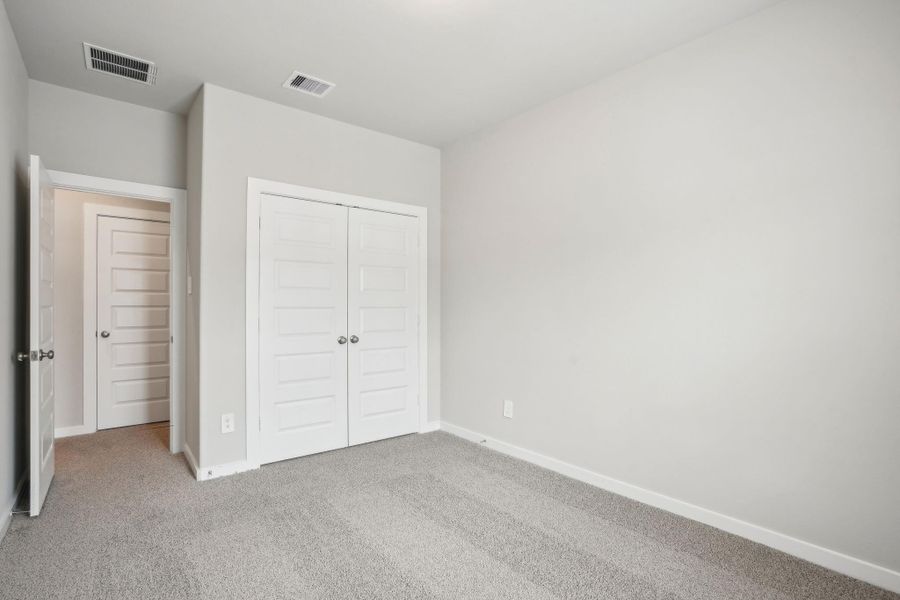 Spacious, unfurnished interior of a new home in Kemah Crossing - City Series, Kemah (Image 39). Spacious, unfurnished interior of a new home in Kemah Crossing - City Series, Kemah (Image 39).