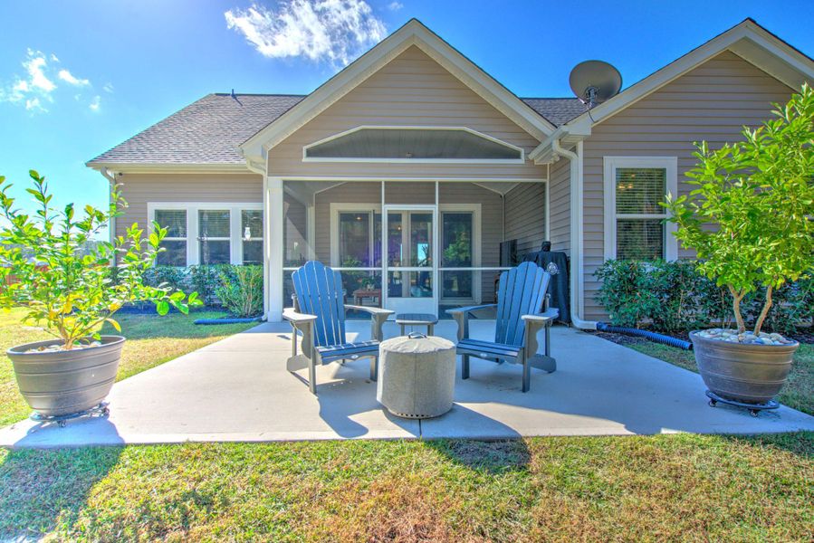 Exterior details and patio area of a home in French Quarter Creek, Huger (Image 26).