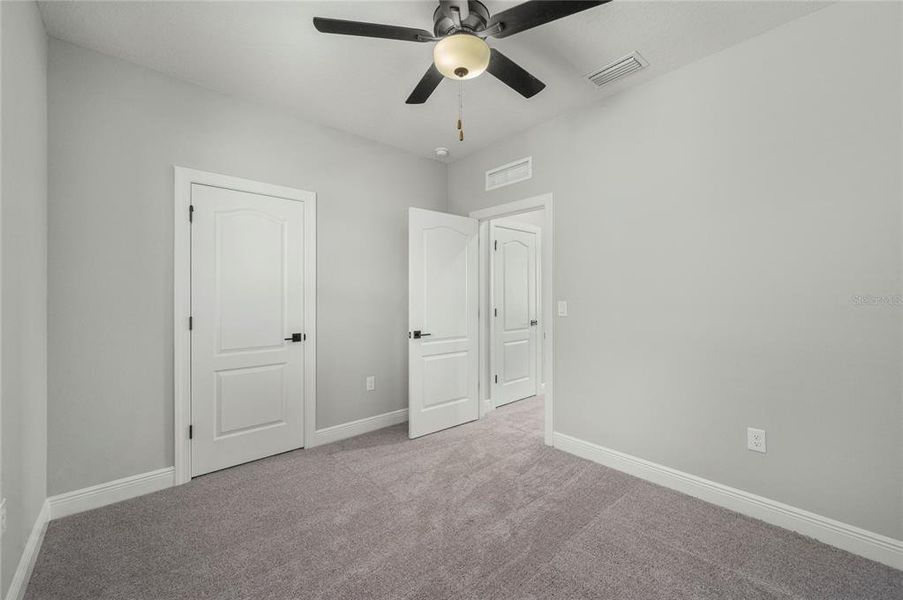 Spacious, unfurnished interior of a new home in Reunion Village, Kissimmee (Image 8).