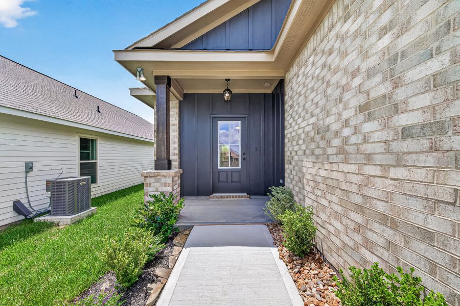 Exterior details and patio area of a home in Mostyn Springs, Magnolia (Image 3).
