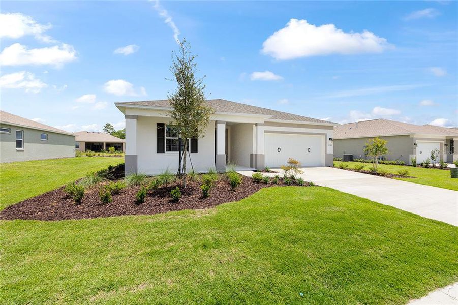 Front exterior of a new home in , Ocala, FL, highlighting curb appeal (Image 18). Front exterior of a new home in , Ocala, FL, highlighting curb appeal (Image 18).