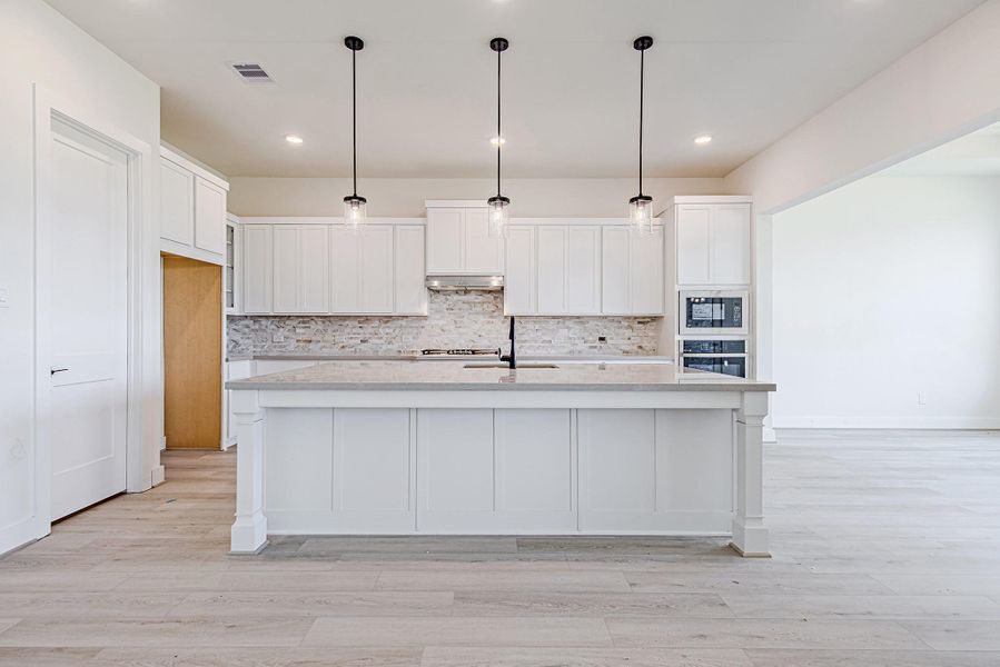 Expansive kitchen island with seating, perfect for entertaining and everyday living
