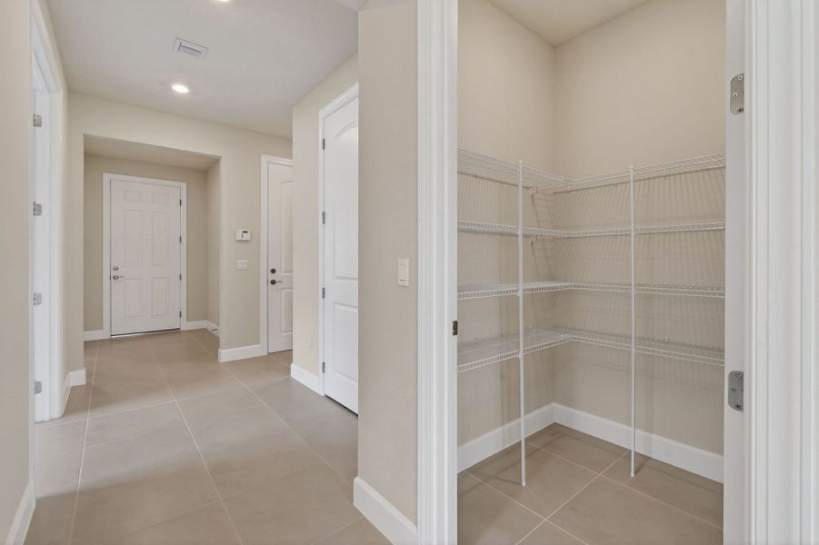 Spacious, unfurnished interior of a new home in Del Webb Tradition, Port St. Lucie (Image 69).