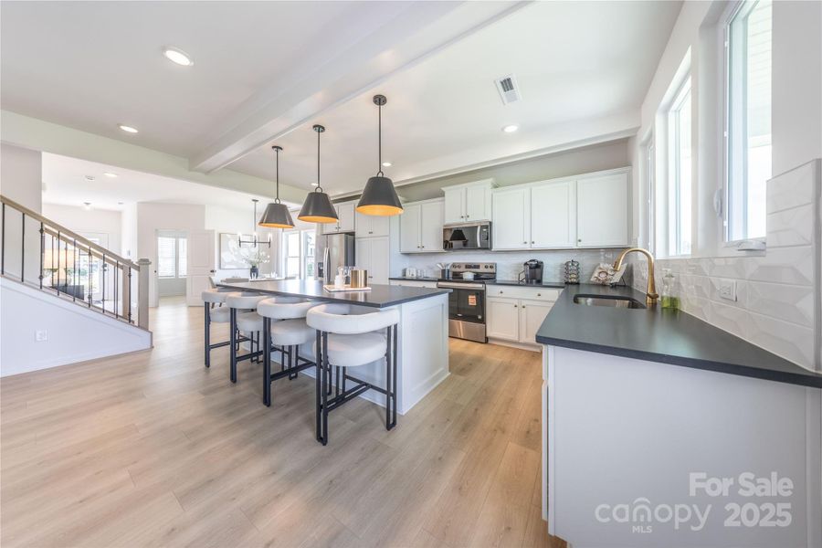 Furnished interior view inside a new home in Whispering Hills, Locust (Image 8).