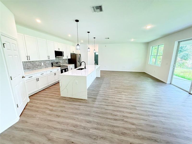 Furnished interior view inside a new home in , North Port (Image 3).
