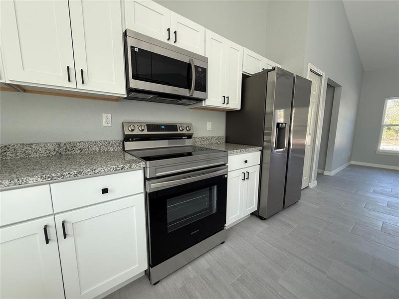 Furnished interior view inside a new home in , Dunnellon (Image 5).