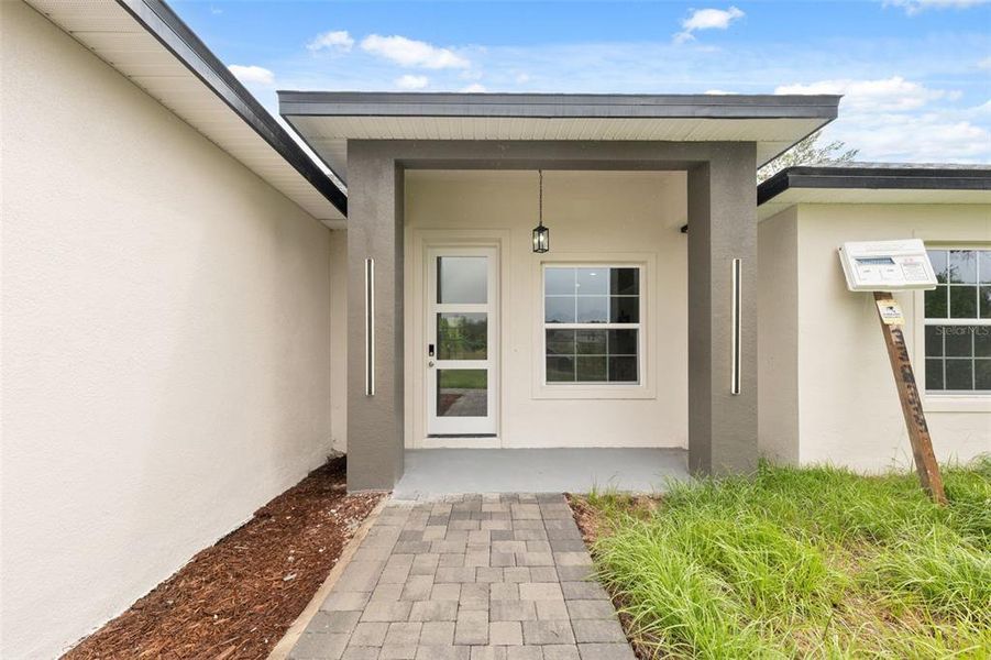 Exterior details and patio area of a home in , Ocala (Image 19).