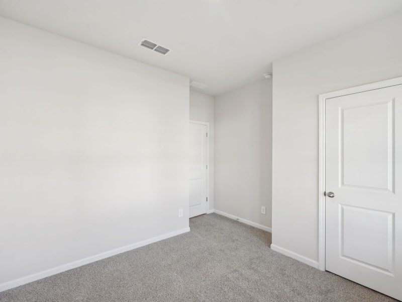 Spacious, unfurnished interior of a new home in Martin Springs - Estate Series, Lawrenceville (Image 27).