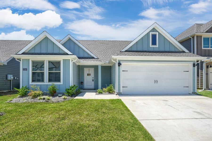 Front exterior of a new home in Enclave at Pecan Creek, Providence Village, TX, highlighting curb appeal (Image 1). Front exterior of a new home in Enclave at Pecan Creek, Providence Village, TX, highlighting curb appeal (Image 1).