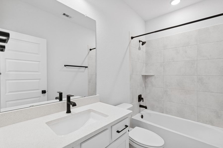 Furnished interior view inside a new home in The Highlands 40', Porter (Image 13).