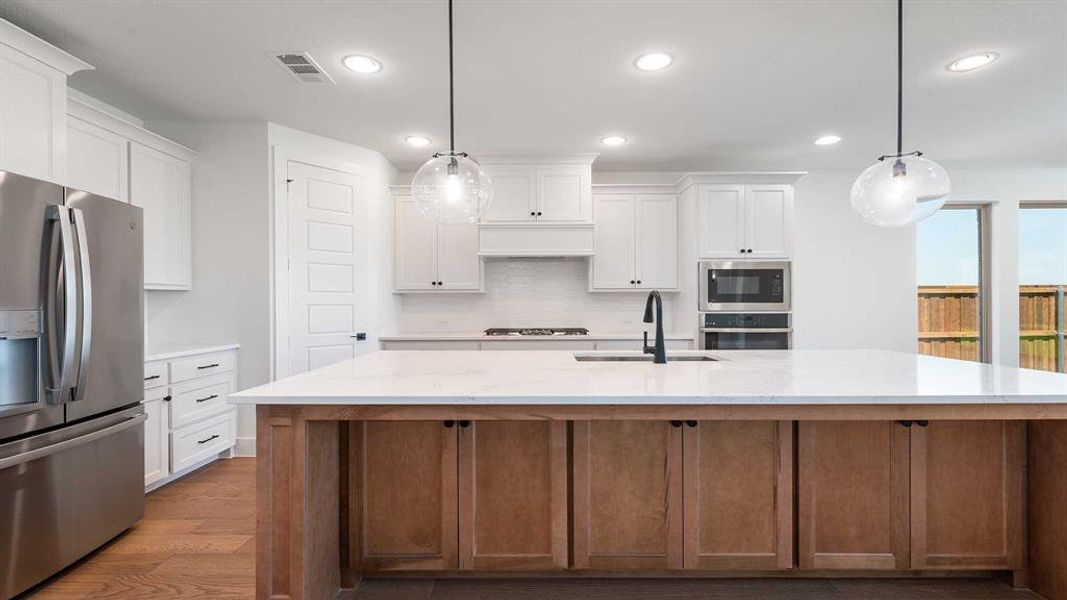 Furnished interior view inside a new home in Mosaic 50', Celina (Image 9).