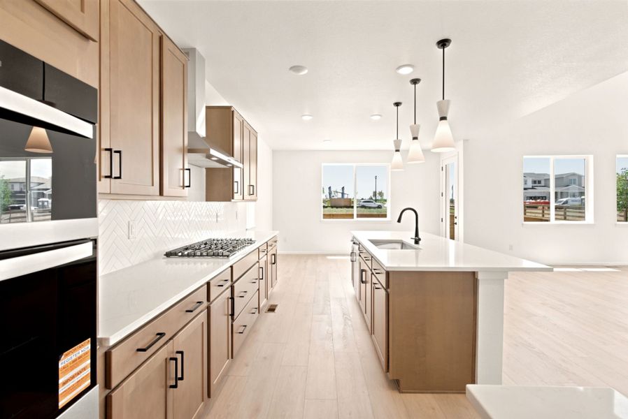 Furnished interior view inside a new home in Cordovan, Firestone (Image 8).