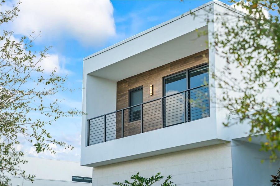 Exterior details and patio area of a home in , Weston (Image 34).