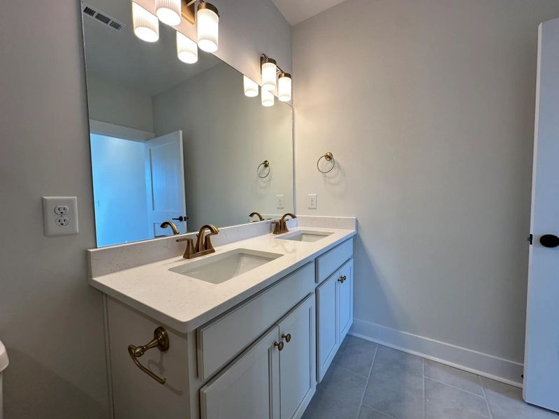 The Neilson A Secondary Suite Bathroom