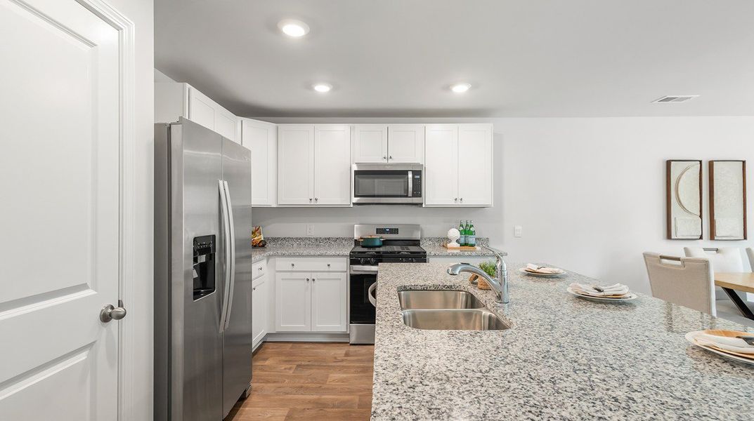 Furnished interior view inside a new home in Pine Hills Townhomes at Cane Bay, Summerville (Image 10).