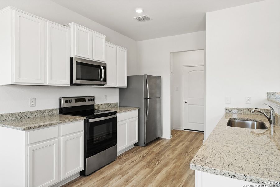 Furnished interior view inside a new home in Blue Wing, San Antonio (Image 6). Furnished interior view inside a new home in Blue Wing, San Antonio (Image 6).