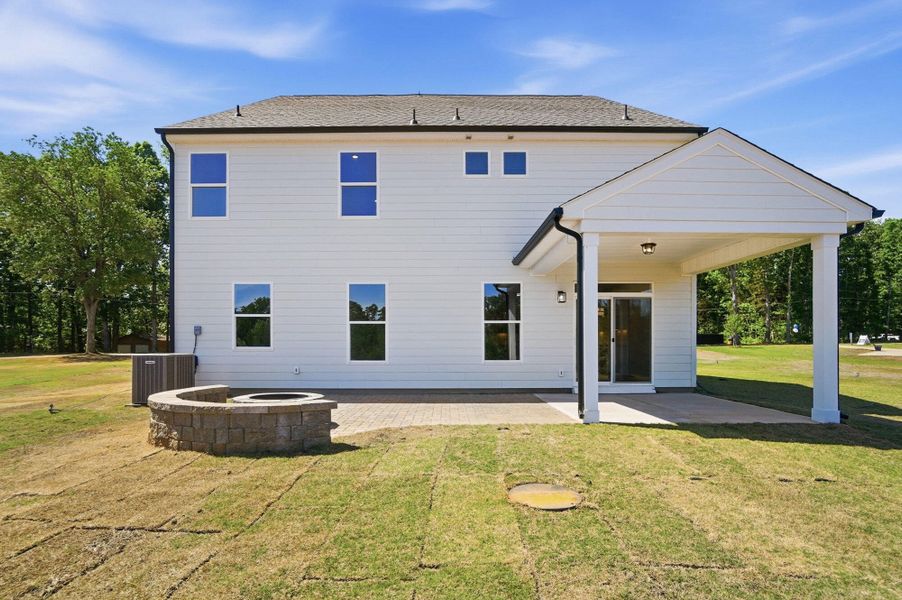 Exterior details and patio area of a home in Chasewood, Mint Hill (Image 28).