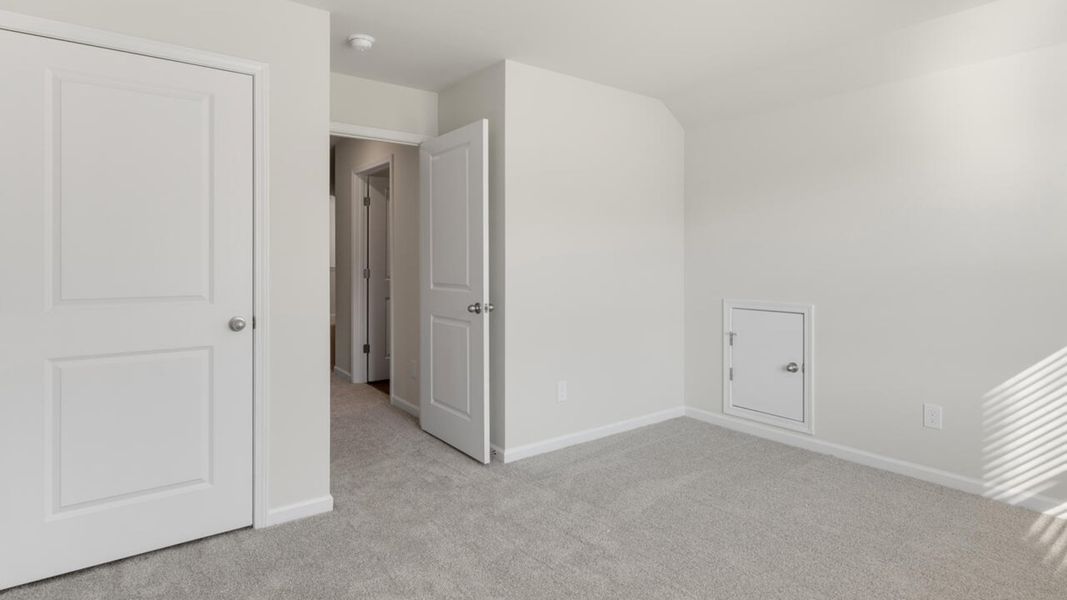 Spacious, unfurnished interior of a new home in Indigo Preserve, Leland (Image 31).