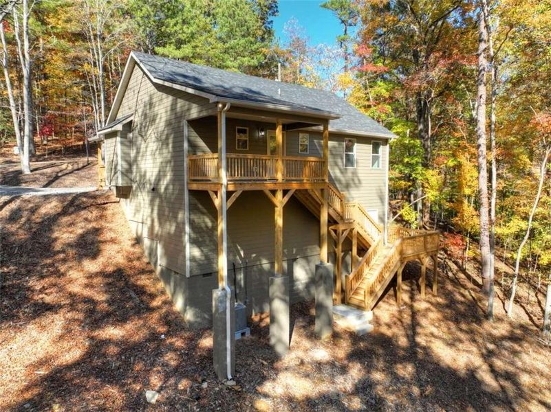Exterior details and patio area of a home in , Ellijay (Image 25).
