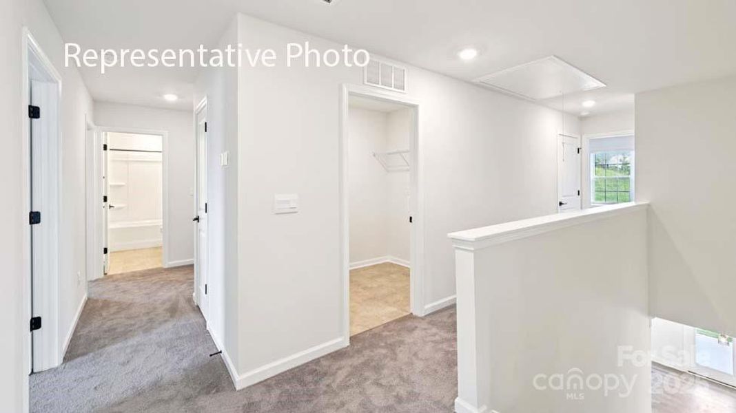 Spacious, unfurnished interior of a new home in Sanctuary at Southgate, Indian Trail (Image 37).