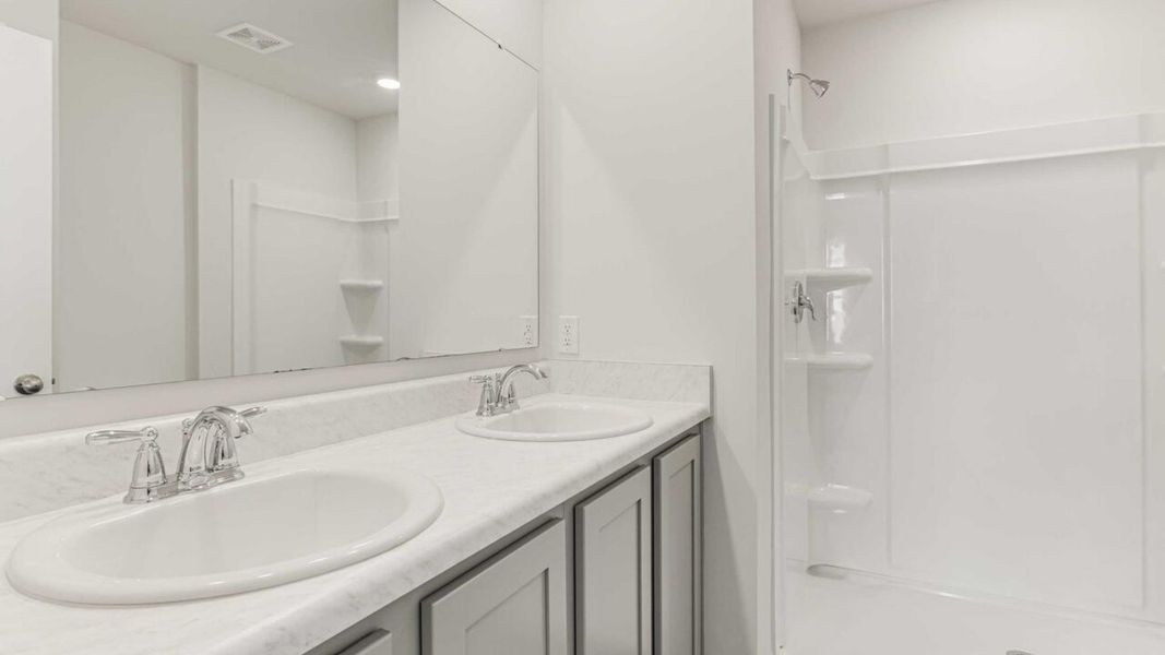 Representative furnished interior of a home built from the Devon by D.R. Horton in Eagle Creek, Bolivia (Image 9).