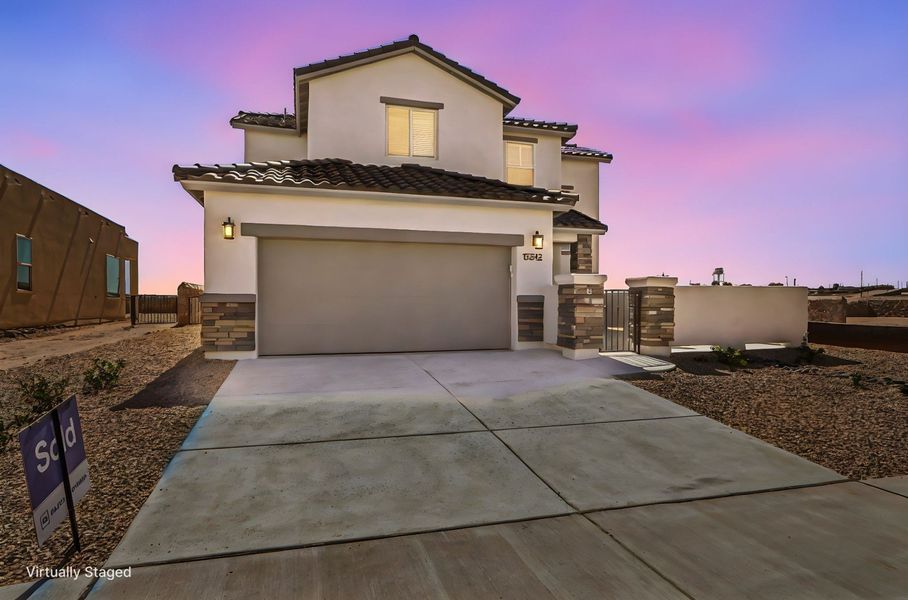 Front exterior of a new home in Emerald Estates, El Paso, TX, highlighting curb appeal (Image 26).