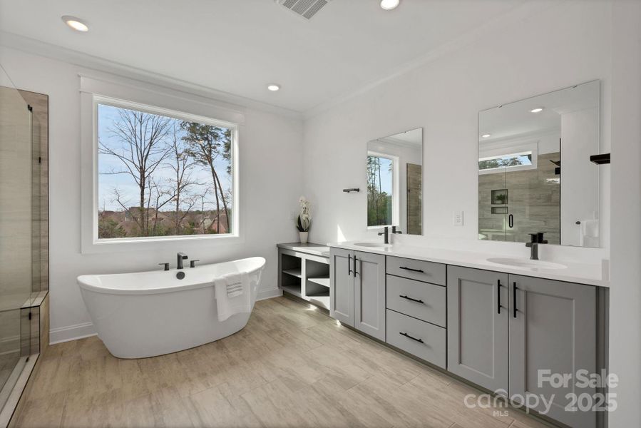 Large walk-in shower and a freestanding tub creating a spa-like retreat