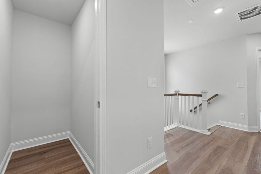 Spacious, unfurnished interior of a new home in Lakeside Townes at Riverlights, Wilmington (Image 24). Spacious, unfurnished interior of a new home in Lakeside Townes at Riverlights, Wilmington (Image 24).
