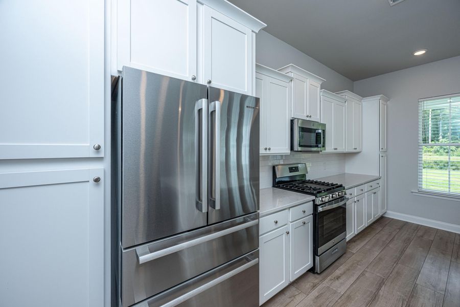 Furnished interior view inside a new home in , Summerville (Image 13).