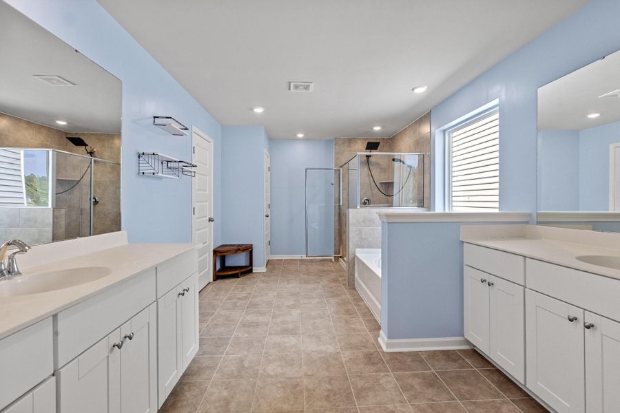 Furnished interior view inside a new home in Sweetgrass at Summers Corner, Summerville (Image 31).