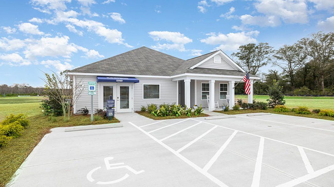 Front exterior of a new home in Cottonwood Place, Tabor City, NC, highlighting curb appeal (Image 19). Front exterior of a new home in Cottonwood Place, Tabor City, NC, highlighting curb appeal (Image 19).