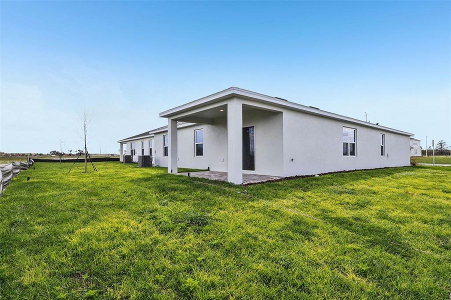 Exterior details and patio area of a home in Willowbrook North, Winter Haven (Image 18).