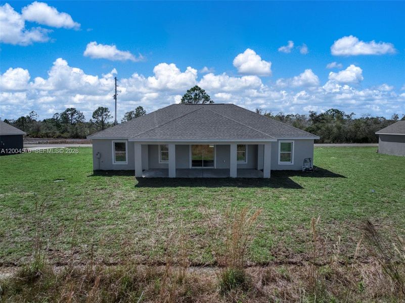 Exterior details and patio area of a home in , Sebring (Image 21).