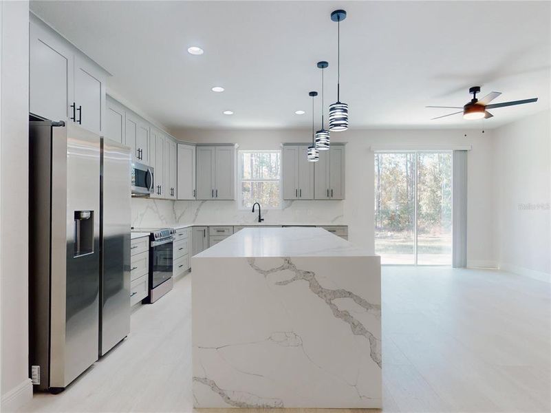Furnished interior view inside a new home in , Dunnellon (Image 6).